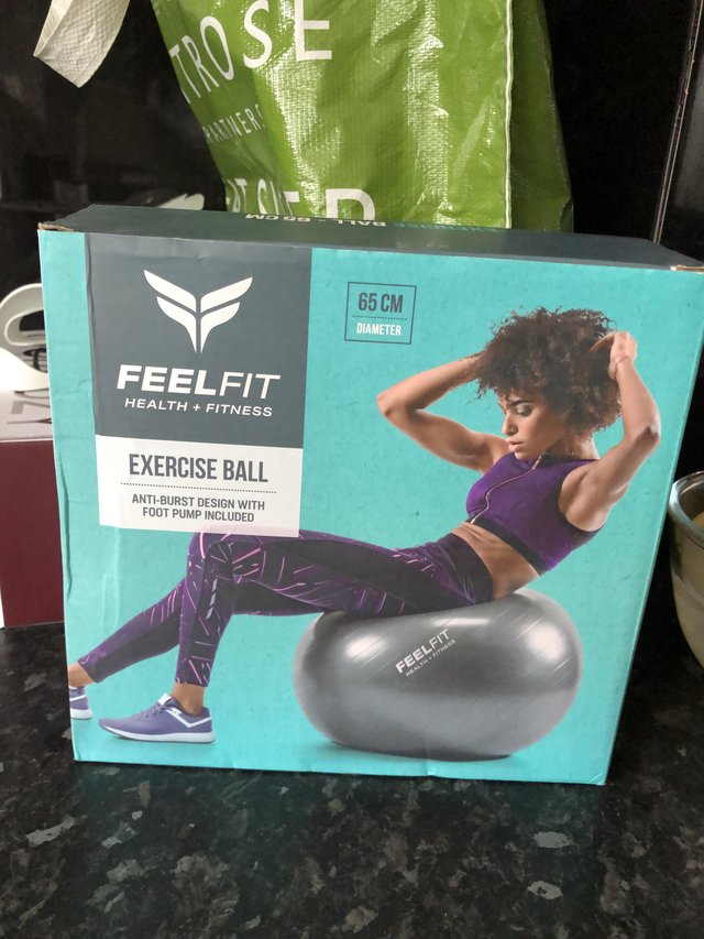 Preview of the first image of Feel fit exercise ball comes with pump an box.
