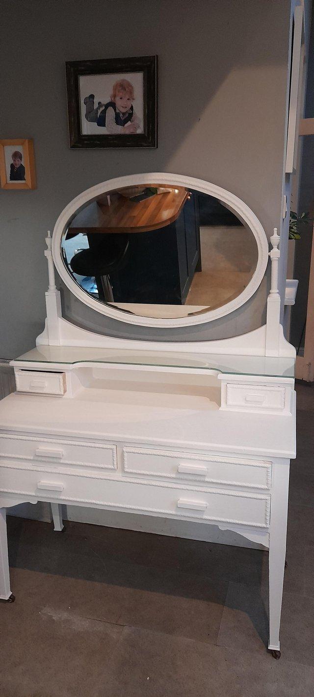 Preview of the first image of Vintage dressing table with 6 drawers and a rotating oval mi.