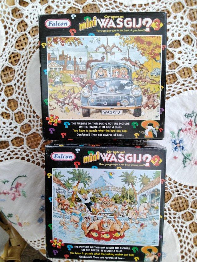Preview of the first image of Wasgij jigsaws.4 Small size. One larger..