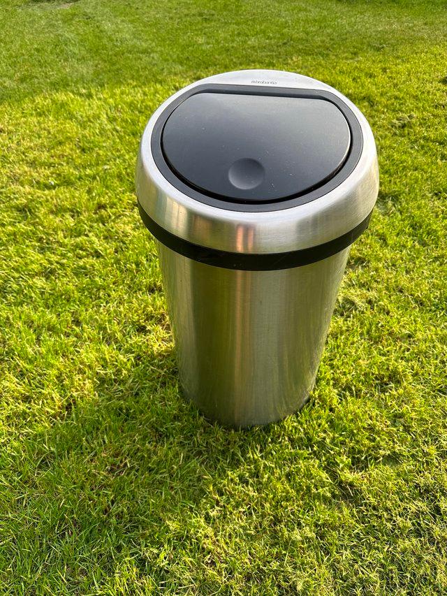 Preview of the first image of Brabantia push top 50ltr bin in stainless steel finish.