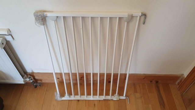 Preview of the first image of Metal wall fix extending bar baby pet gate.