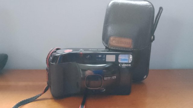 Preview of the first image of Canon Sure shot camera and case.