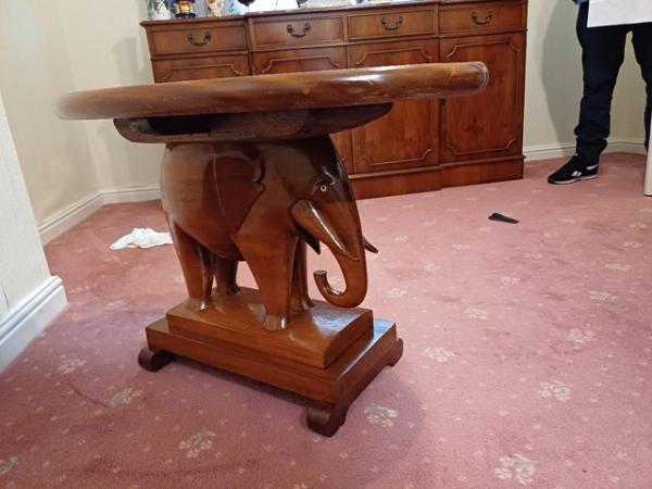 Image 2 of Beautiful African mahogony hand carved elephant based table