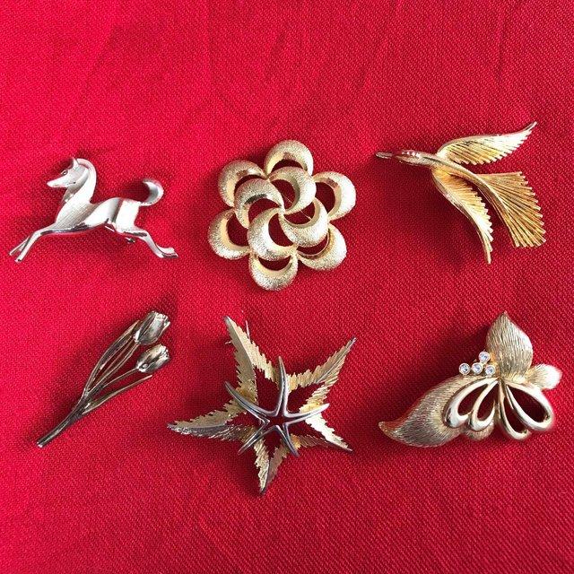 Preview of the first image of 5 vintage/with age goldtone brooches. HORSE SOLD..