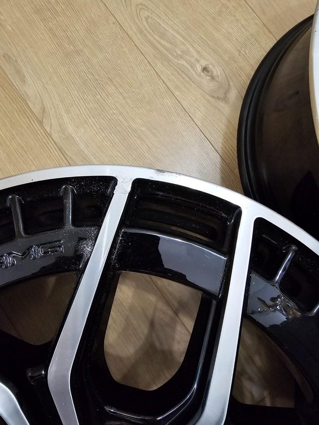 Preview of the first image of 2 Genuine AMG 19 Alloy Wheels - Kerbed.