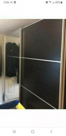 Image 2 of Ikea pax wardrobe with sliding doors black colour