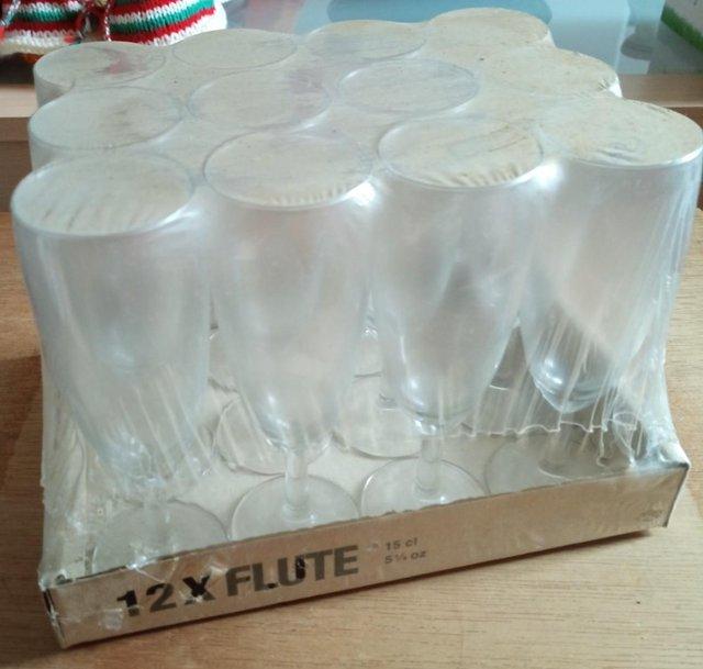 Preview of the first image of Set 12 short stem flute champagne glasses - unopened pack.
