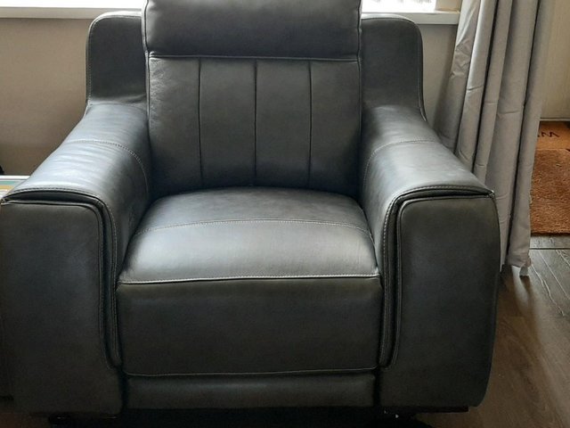 Preview of the first image of two and single seater leather reclining chairs.