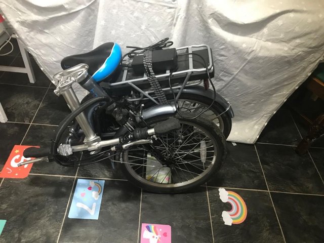 Preview of the first image of Basis osprey step through folding E-bike for sale.
