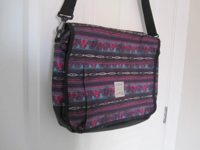 Preview of the first image of Hot tuna messenger bag purple.