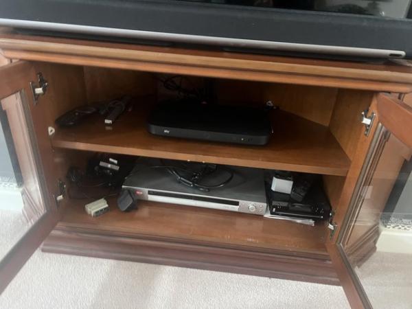 Image 2 of Bradley tv stand and cabinet.