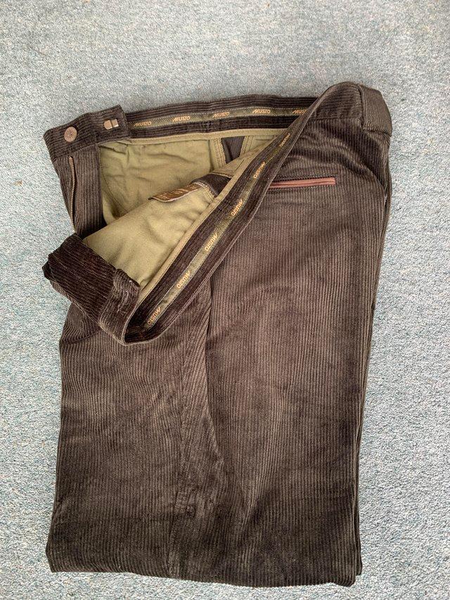 Preview of the first image of Men’s Musto Olive green cord trousers40R.