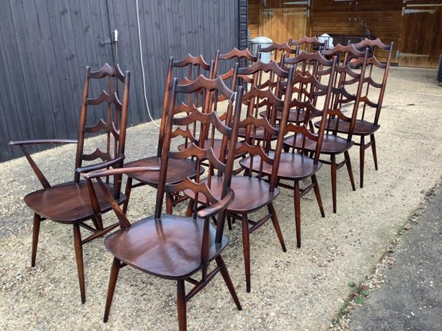 Preview of the first image of Ercol rare set 10 bat wing dining chairs.
