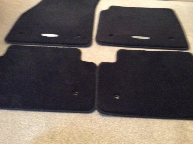 Preview of the first image of Jaguar car mats in black.