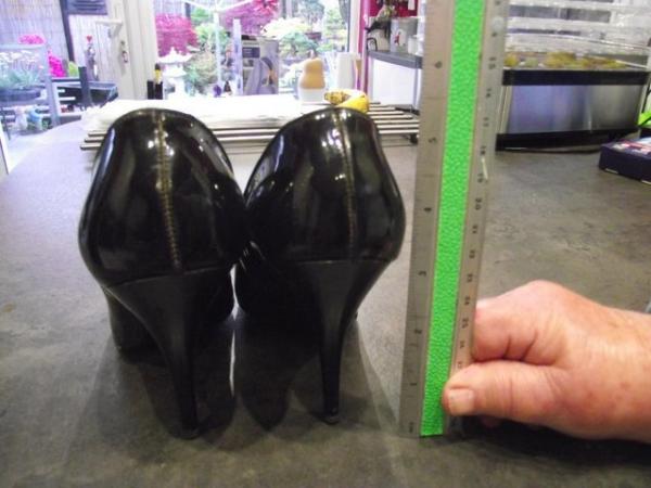 Image 3 of A pare of black patent leather high heels