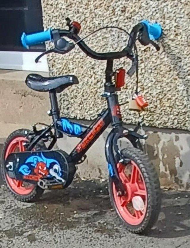 Preview of the first image of Children's bike black, blue, red.