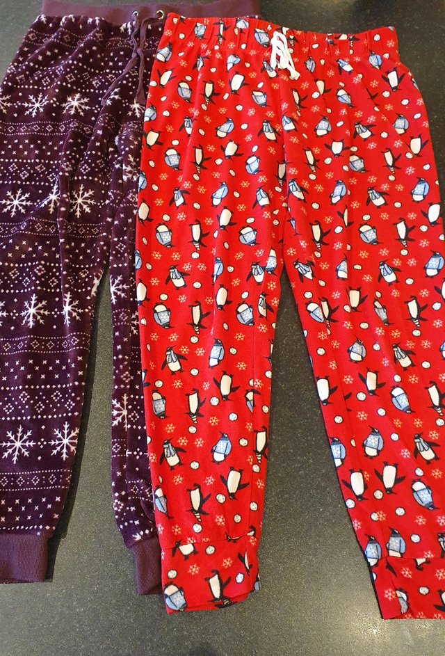 Preview of the first image of 2 x Fleece pyjama bottoms size 16/18.
