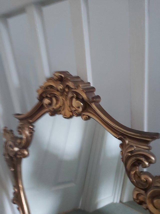 Preview of the first image of Gorgeous shape gilt coloured Mirror.