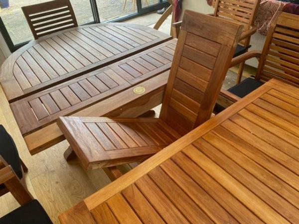 Image 2 of Teak extendable patio table, 8 chairs and parasol