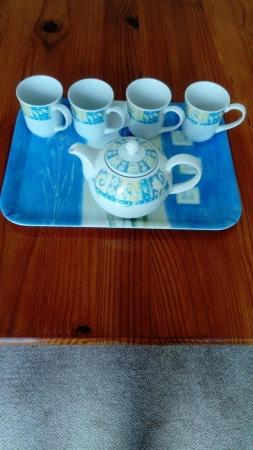 Image 1 of Teapot, four mugs and tea tray.