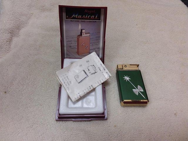 Preview of the first image of VINTAGE JAPANESE SANKYO MUSICAL CIGARETTE LIGHTER 1970s.
