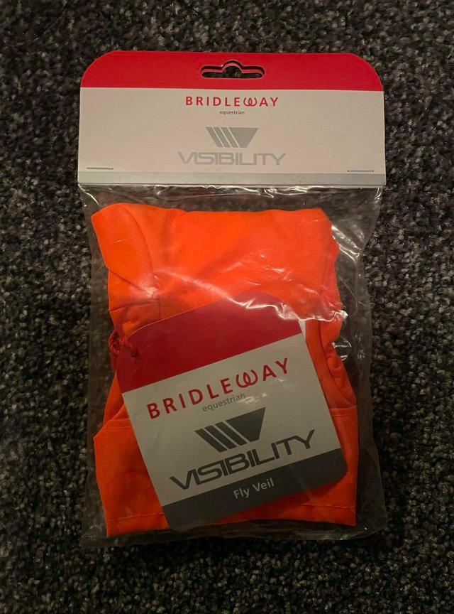 Preview of the first image of Bridleway Orange Hi Viz Fly Veil Ears Pony Size.