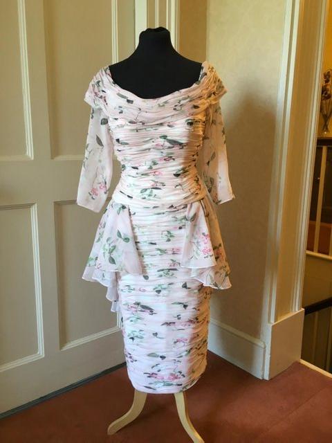 Preview of the first image of Ian Stuart Mother of the bride size 10  detachable peplum.