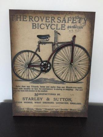 Image 1 of METAL PICTUREOF VINTAGE CYCLE IN BROWN/BEIGE COLOURS