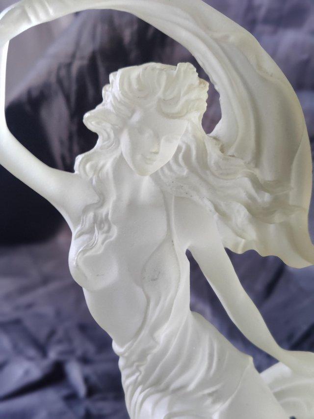 Preview of the first image of Art nouveau frosted lucite figurine signed.
