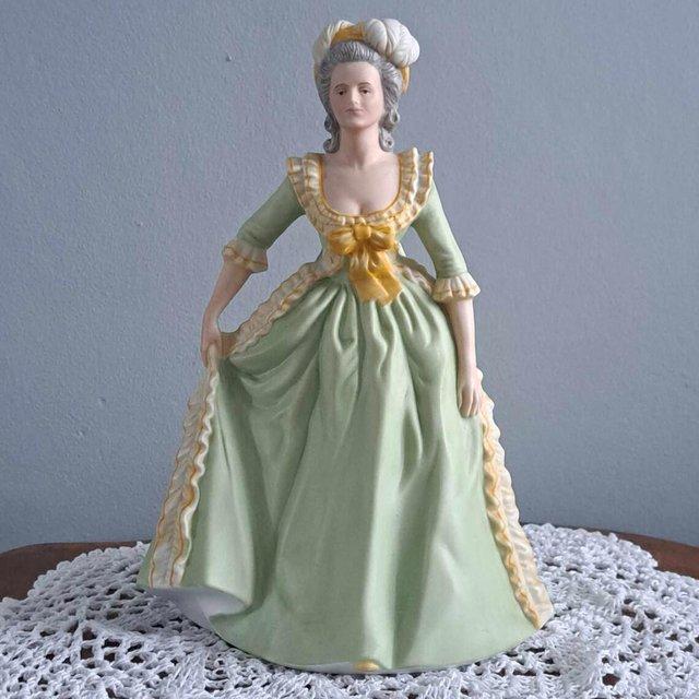 Preview of the first image of Marie Antoinette Porcelain Figurine.
