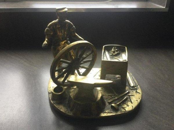 Image 3 of Vintage Brass Sculpture of a Blacksmith with wagon wheel