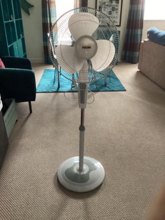 Image 1 of White floor standing Electric fan.