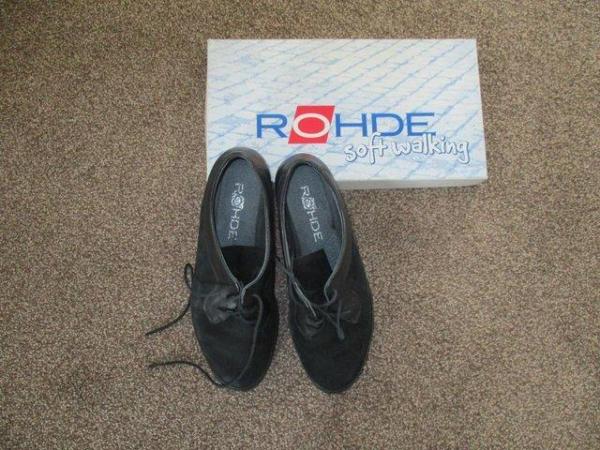Image 1 of Black suede lace up shoes.
