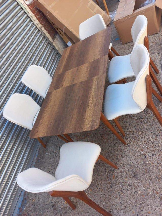 Preview of the first image of Branded Dining Table With Chiars Available in Stock.