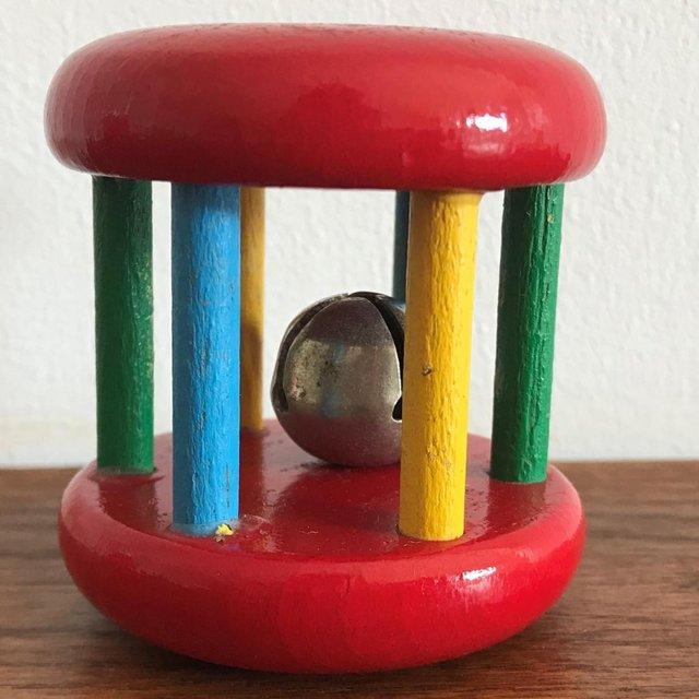 Preview of the first image of Vintage 1980's Boots Roller Bell wooden baby's rattle.