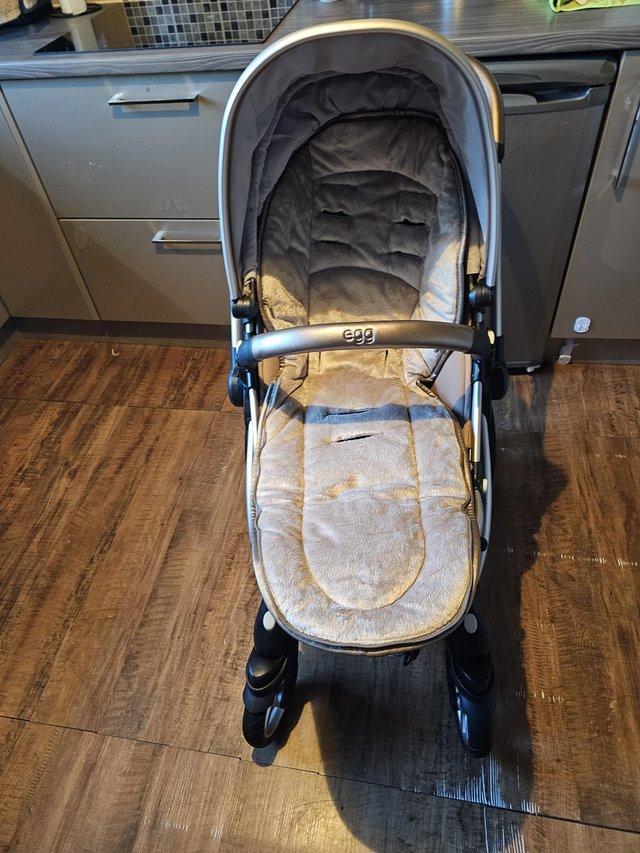 Preview of the first image of Beautiful Egg Pram and Isofix Car Seat.