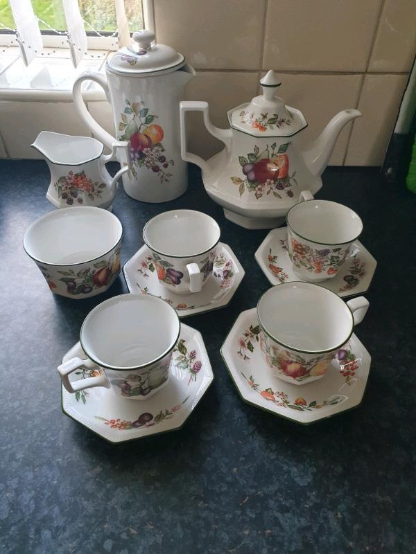 Preview of the first image of tea pot coffee pot milk jug sugar cups saucers.