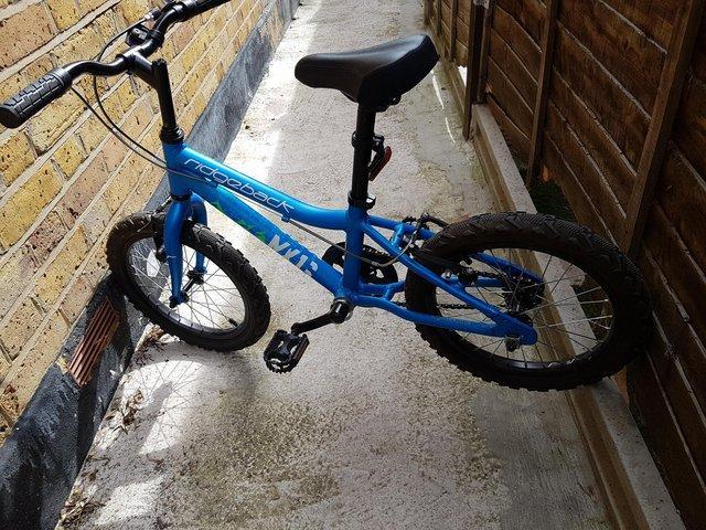 Preview of the first image of Kids bike Ridgeback MX16 with stabilizers.