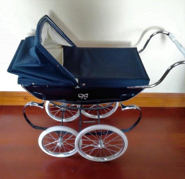 Preview of the first image of VINTAGE 1973 SILVER CROSS DOLLS PRAM Original Navy Balmoral.