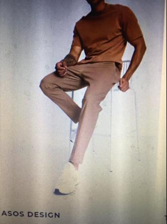 Image 1 of ASOS Design tapered Chinos in biege-neutral.