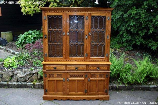 Preview of the first image of OLD CHARM VINTAGE OAK DISPLAY CABINET DRESSER SIDEBOARD UNIT.