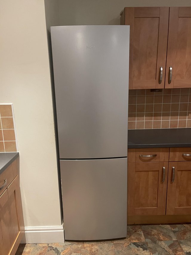 Preview of the first image of Haier Tall Freestanding Fridge Freezer Silver 70/30, Used.