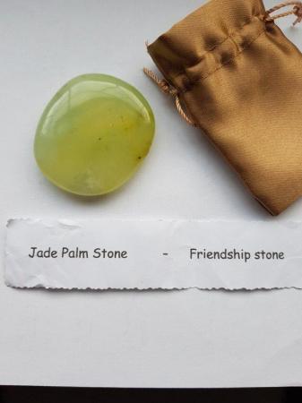 Image 5 of A jade palm stone also known as a friendship stone