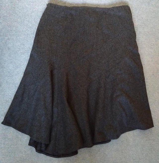 Preview of the first image of Next grey woollen pleated asymmetrical skirt- size 14 (UK).