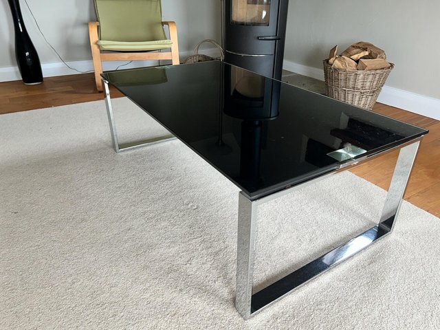 Preview of the first image of Black glass rectangular coffee table.