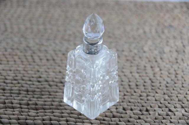Preview of the first image of Antique Cut Glass Perfume Bottle With Stopper Silver Collar.