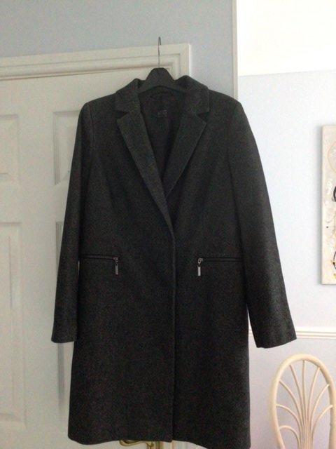 Preview of the first image of M and S grey coat lovely design with detail zip pockets.