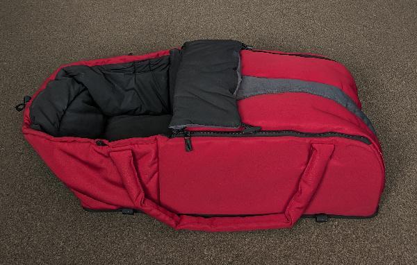 Preview of the first image of Phil & Teds Cocoon/Carrycot in Red & Charcoal.