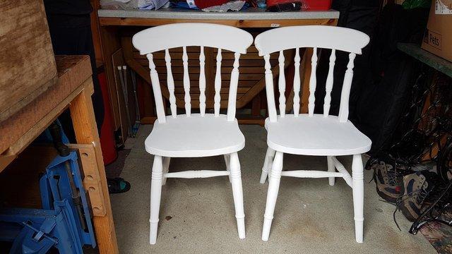 Preview of the first image of Pair of kitchen chairs, Windsor type Lathback.