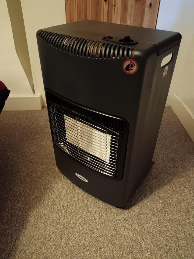 Preview of the first image of 1 month old heater cabinet and 15 kg gas bottle.